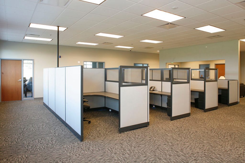 Mini cubicles in a big office.