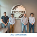 Four summer interns at BCCG standing together with excitement and determination, ready to make a positive impact. From left to right: Nick - Pre-Construction, Joseph - Accounting, Devon - Operations, Jaron - Operations.